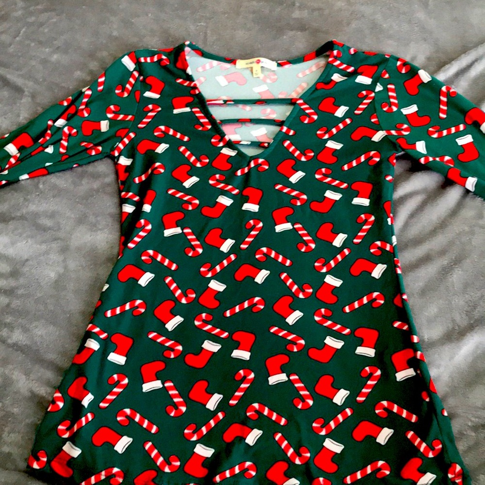 Long sleeve shirt with candy canes and stockings
